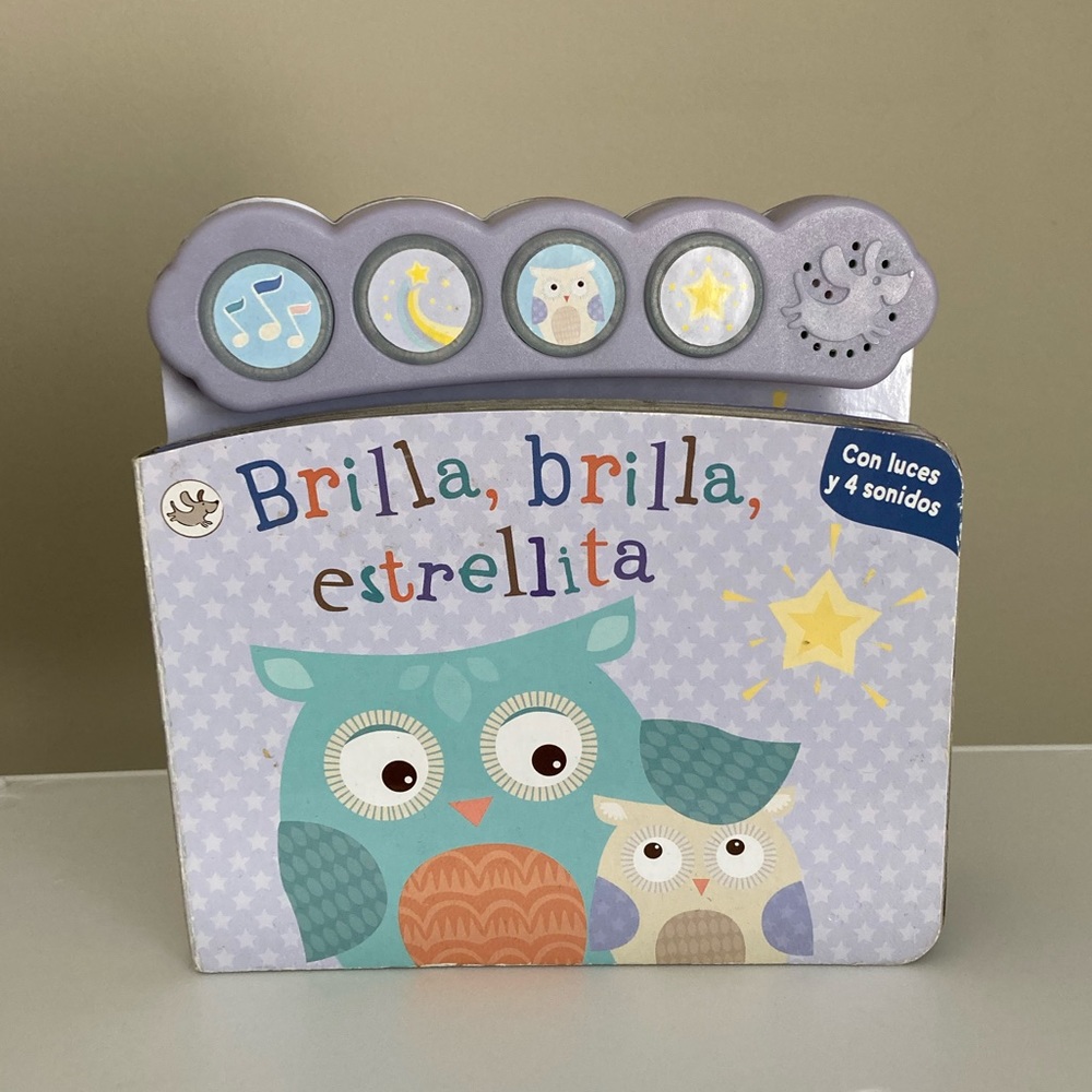Free with any toy purchase. Baby book in Spanish